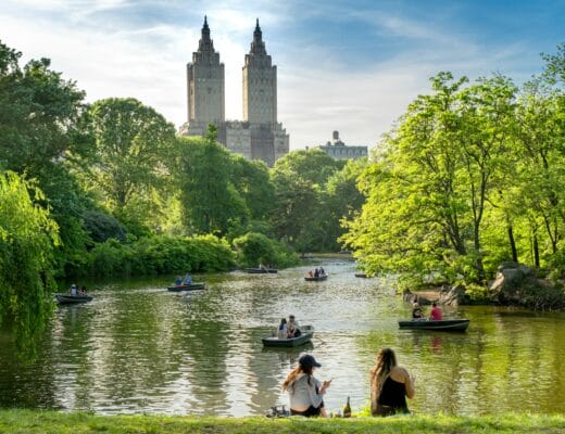 a group of people on small boats on a river